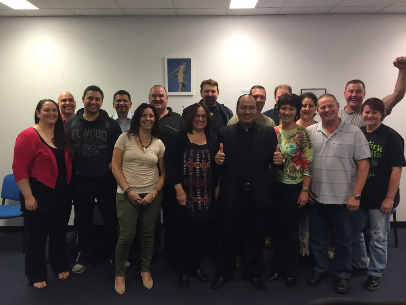 A Global Hypnosis Academy class photographed together at the end of their in-class training